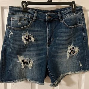 Judy Blue Distressed daisy patch denim shorts.  New w/out tag.  So cute!